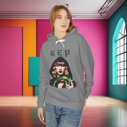 Unisex cotton hoodie for Swifties featuring a striking design of Taylor Swift in a glittery bodysuit, available in 8 elegant colours.