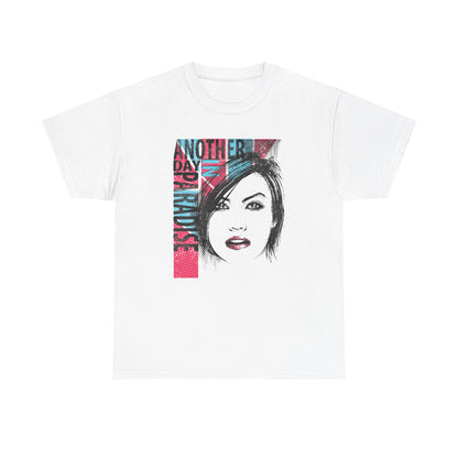 Stylish white t-shirt featuring a captivating graphic portrait art of a woman with striking blue eyes and bold red lips, complemented by the vibrant text 'ANOTHER DAY IN PARADISE' in stylish fonts.