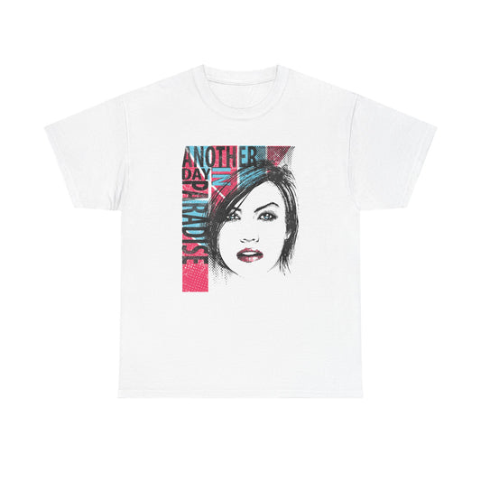 Stylish white t-shirt featuring a captivating graphic portrait art of a woman with striking blue eyes and bold red lips, complemented by the vibrant text 'ANOTHER DAY IN PARADISE' in stylish fonts.
