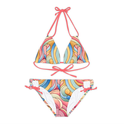 Pastel Pink Abstract Strappy Bikini Set by Dazzling Dreams Studio, luxurious swimwear designed for stylish summers, featuring unique abstract design and quick-dry fabric for ultimate comfort.