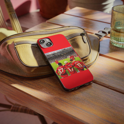 Chic Manchester United Mainoo Garnach Hojlund Soft Phone Case elegantly placed on a stylish table, showcasing its design with players in action.