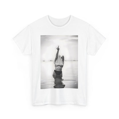 Middle Finger Girl Graphic T-Shirt featuring a striking black and white image of a woman defiantly raising her arm while standing in tranquil waters, crafted from premium soft cotton for urban unisex styling.