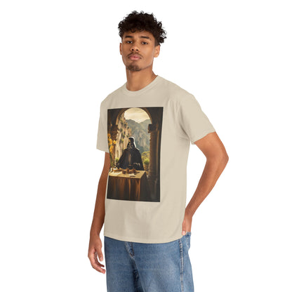 Model wears a light beige t-shirt adorned with a stunning print of Darth Vader against a picturesque background, embodying chic casual luxury.