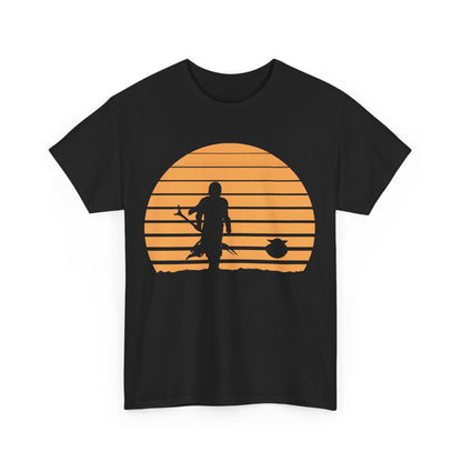 Mandalorian Sunset Graphic Unisex T-Shirt in Premium Soft Cotton featuring a stunning silhouette of the iconic Mandalorian against a vibrant sunset backdrop, perfect for fans of epic Star Wars adventures.