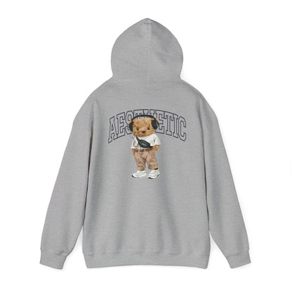 Sophisticated grey hoodie with playful teddy bear artwork on the back, embodying a unique fashion statement.