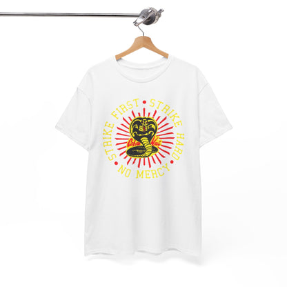 Chic hanging Cobra Kai t-shirt, accentuated with a dynamic snake graphic and the motto 'Strike First, Strike Hard, No Mercy', offering a statement of strength and sophistication.