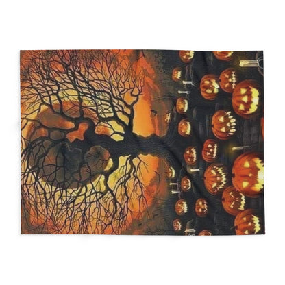 A beautifully designed Decorative and Warm Halloween Spooky Arctic Fleece Blanket displayed flat, showcasing an intricate illustration of a spooky tree and glowing pumpkins, perfect for autumn décor.