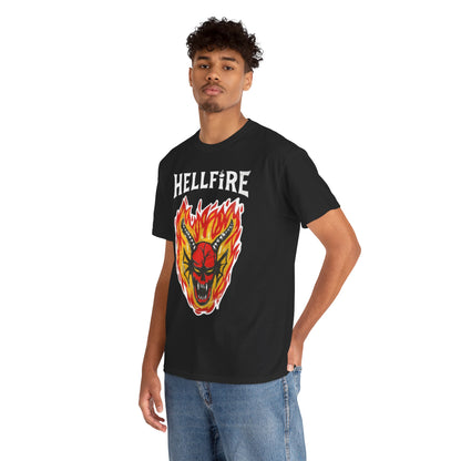 Male model sporting a Hellfire Club T-shirt, displaying an eye-catching graphic of flames and a devilish skull, exuding a trendy and playful vibe for casual outings.
