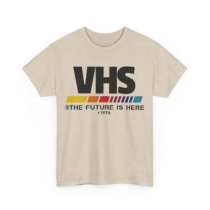 VHS Retro Logo Graphic Tee for Unisex | Soft Cotton, Nostalgic Design, Classic Fit - Front view of a cream t-shirt featuring a striking VHS logo with 'THE FUTURE IS HERE', embodying retro charm.