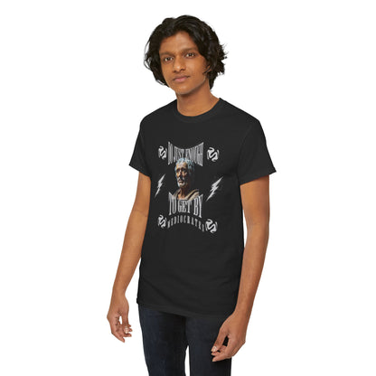Stylish young man showcasing a black t-shirt with the statement 'DO JUST ENOUGH TO GET BY MEDIOCRATES,' radiating a modern and relaxed elegance.