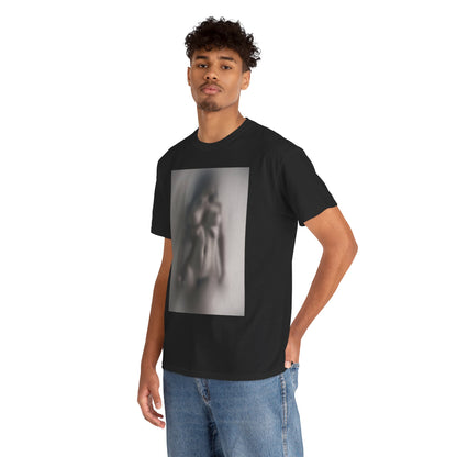 Stylish model showcasing a premium black graphic t-shirt adorned with an elusive abstract design, embodying sophistication and uniqueness in a minimalist setting.