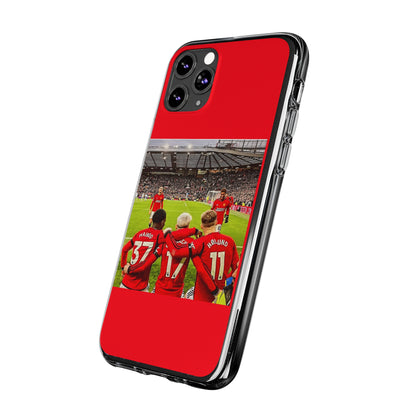 Dynamic angle of the Manchester United Mainoo Garnach Hojlund Soft Phone Case, featuring vivid imagery of players, perfect for showcasing your support in an elegant manner.