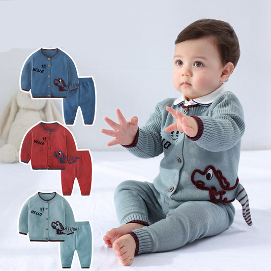 Luxurious Children's Cardigan Suit for Baby Outing featuring a stylish toddler in soft blue cardigan and matching trousers with playful dinosaur design, perfect for fashionable outings.