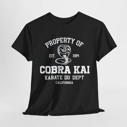 Luxurious black graphic T-shirt featuring the iconic Cobra Kai logo, with bold white text reading 'Property of Cobra Kai Karate Do Dept California', est. 1984, embodying a stylish homage to martial arts nostalgia.