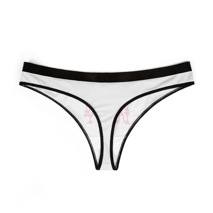 Sleek presentation of 'SLIPPY WHEN WET' thong panties, showcasing a minimalist design with contrasting black trims and playful pink print, perfect for adding luxury to any collection.
