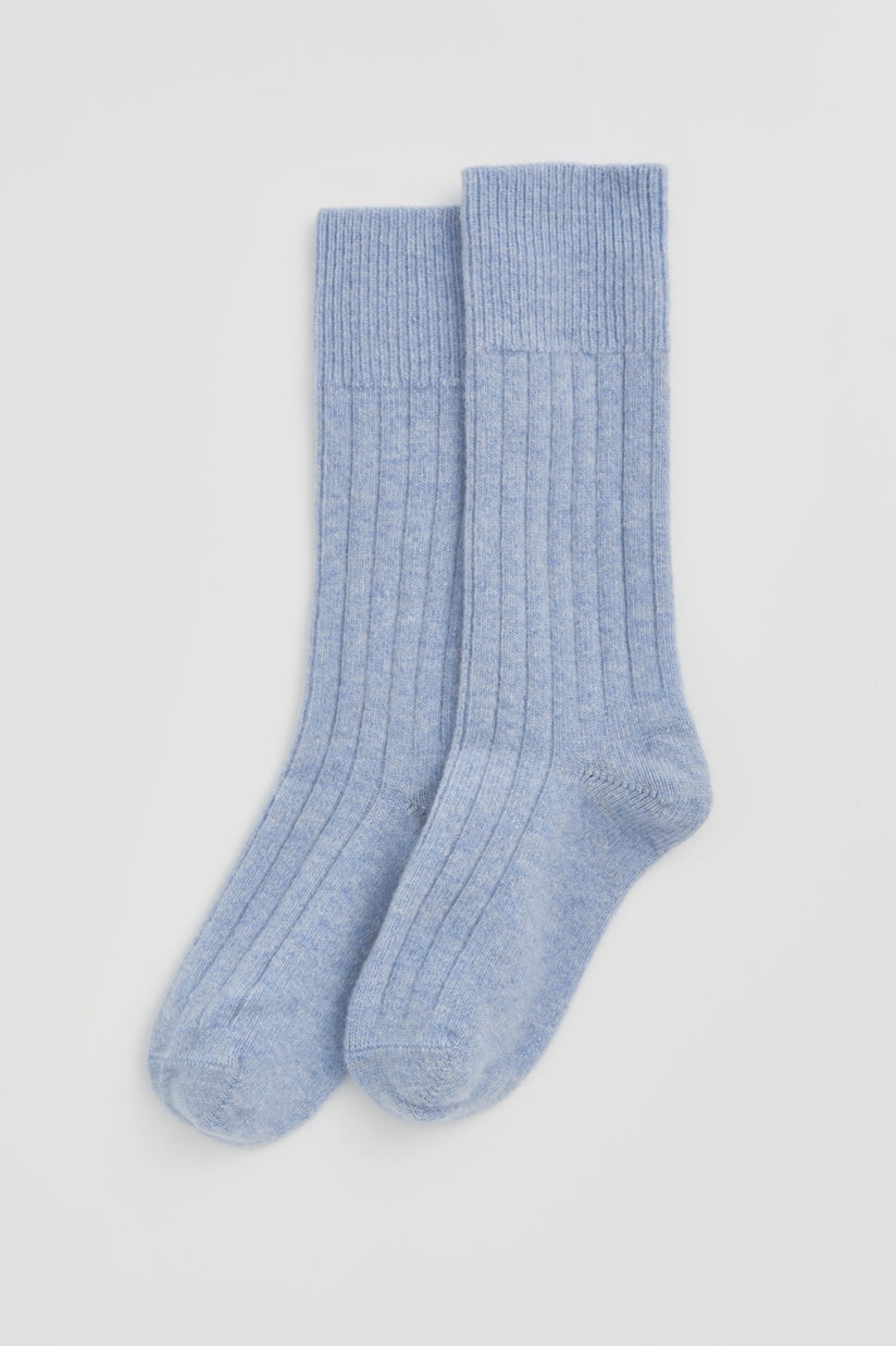 Luxury Merino bed socks, showcasing their exquisite softness and elegant design, perfect for maintaining comfort at night.