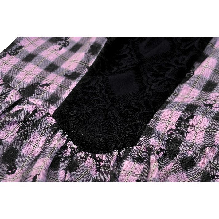 Elegant display of the Dark In Love Ellery Dress highlighting its vibrant butterfly print and comfortable fit, ideal for stylish outings.