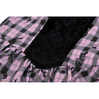 Elegant display of the Dark In Love Ellery Dress highlighting its vibrant butterfly print and comfortable fit, ideal for stylish outings.