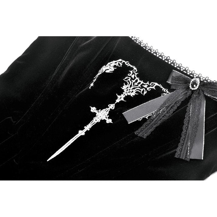 Model wearing the Dark In Love Lux Black Velvet Maxi Dress in an elegant outdoor setting, exuding gothic charm and luxury.