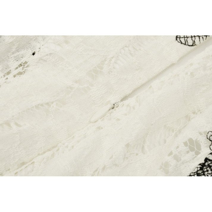 Dramatic high-low hemline of the Dark In Love Zosia Black Butterfly Dress, highlighting its unique silhouette and sophisticated ruched skirt, ideal for gothic fashion enthusiasts.