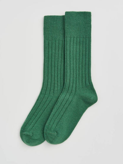Close-up of Merino bed socks made from high-quality fabric, highlighting temperature-regulating properties for ultimate comfort.