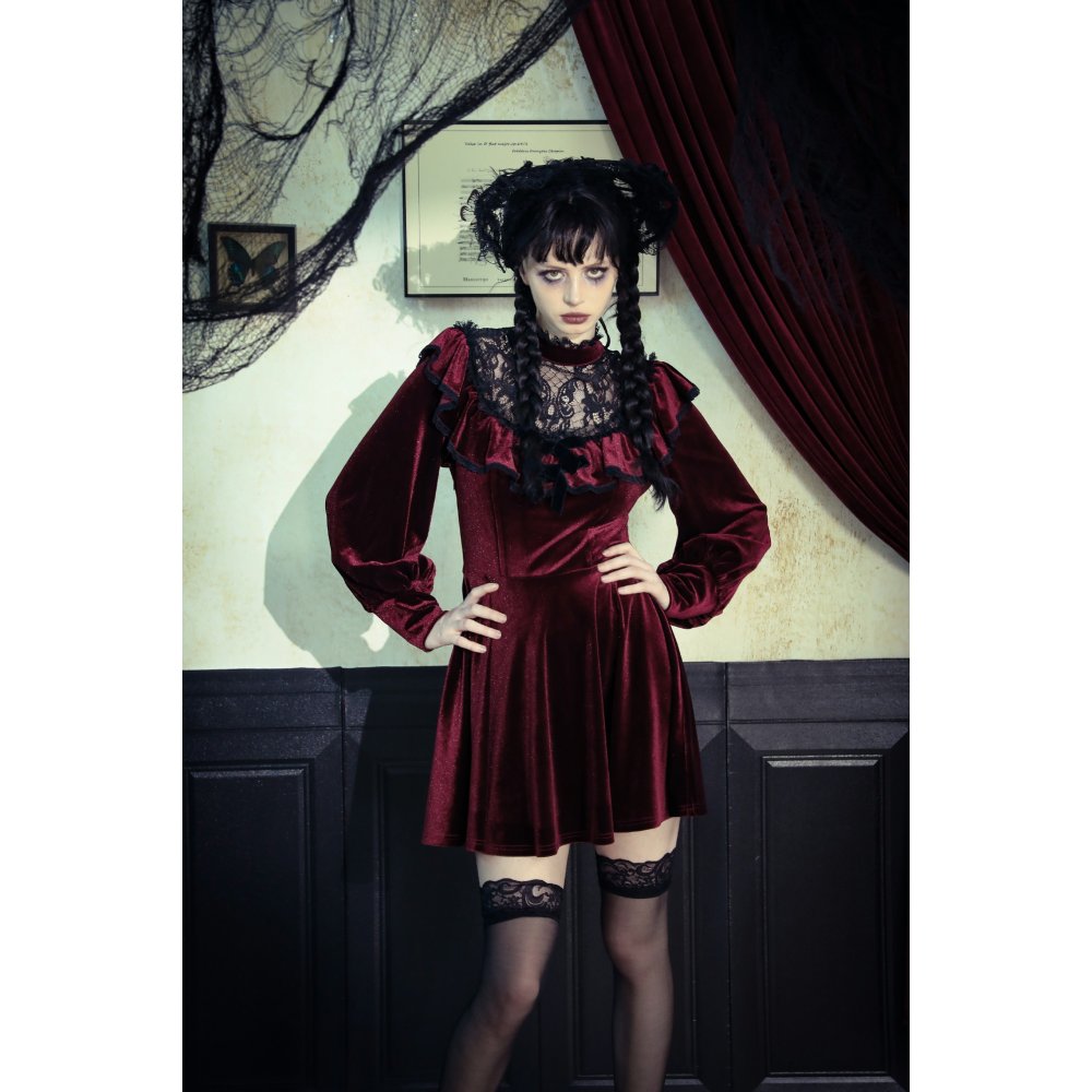 Chic details of the Dark in Love Verity burgundy velvet dress, illustrating the luxurious fabric blend and elegant design.