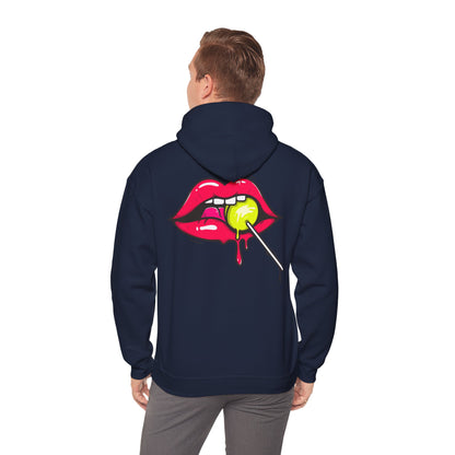 Stylish male model wearing a navy hoodie with a striking back print of seductive red lips and a dripping lollipop, exemplifying contemporary streetwear fashion.