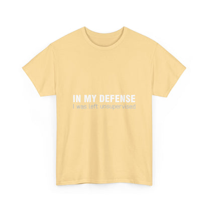 Elegant 'In My Defence I Was Left Unsupervised' Graphic T-Shirt in soft yellow, offering a stylish, unisex fit crafted from premium cotton.