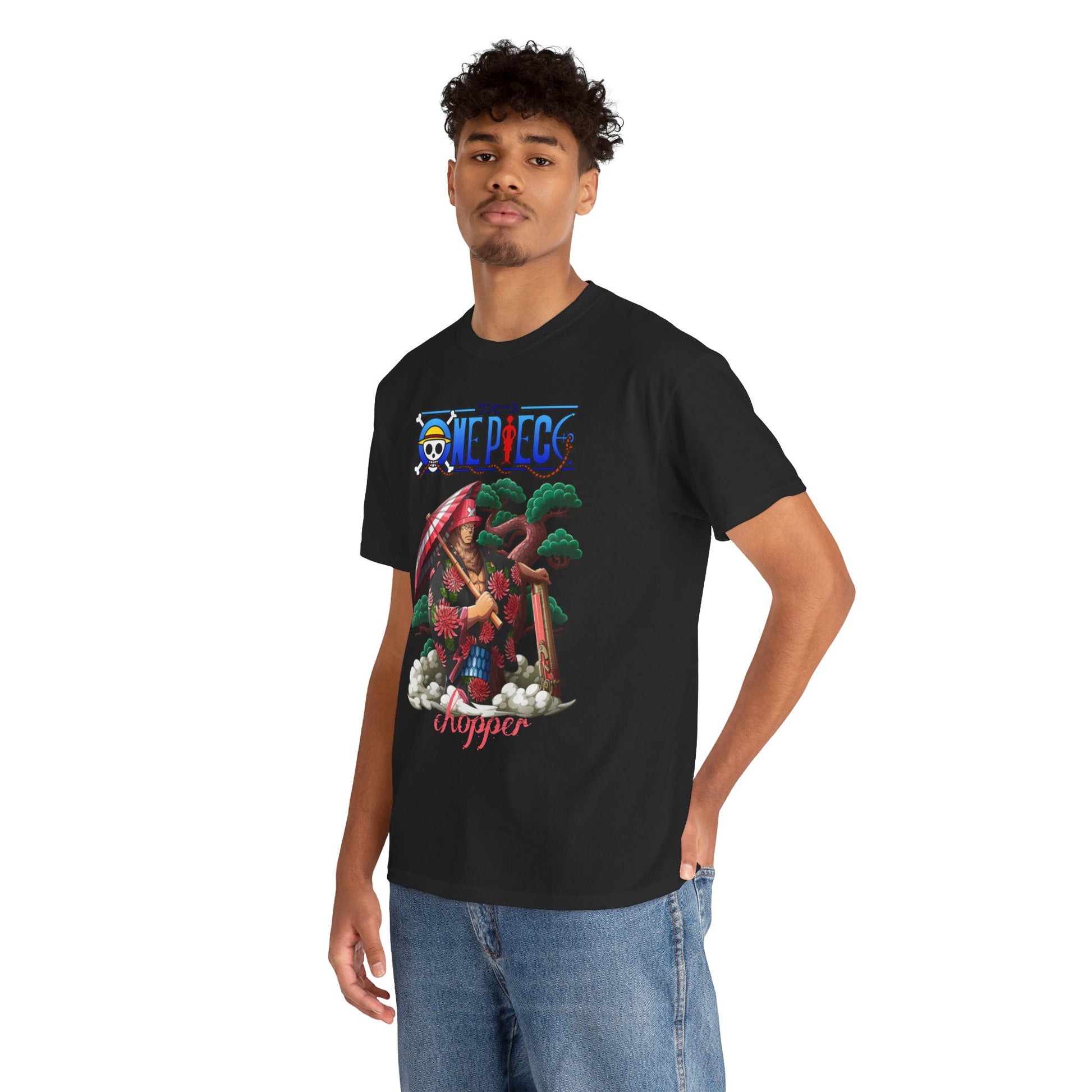 Man modelling a luxury black t-shirt adorned with a colourful illustration of Chopper from One Piece, showcasing a blend of style and anime culture.