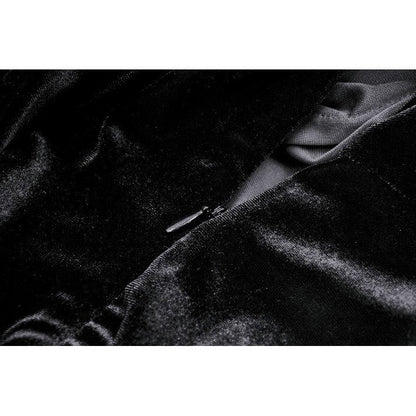 Model wearing the Gothic velvet mermaid dress in an atmospheric setting, showcasing its dark, regal style ideal for gothic-themed events.