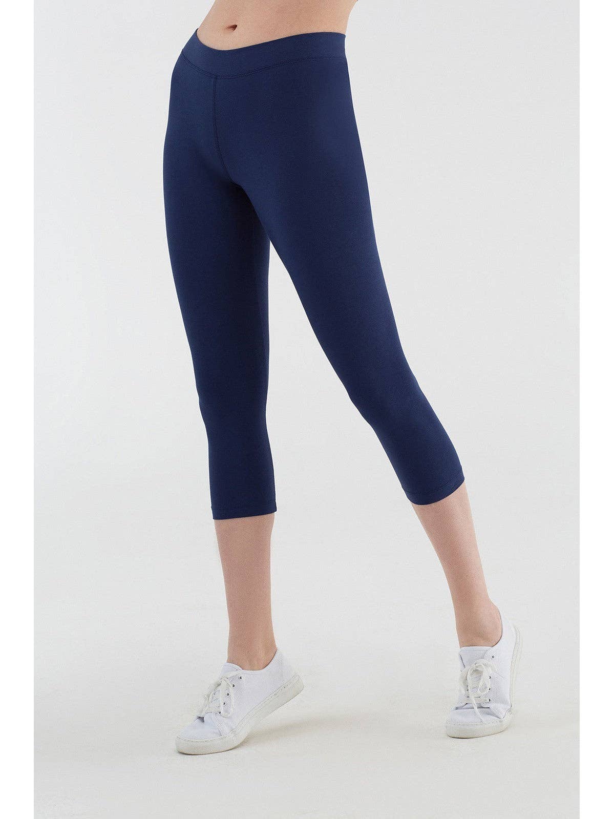 Flat lay of luxury organic stretch 7/8 leggings showcasing the soft texture and high-quality craftsmanship ideal for sustainable fashion enthusiasts.