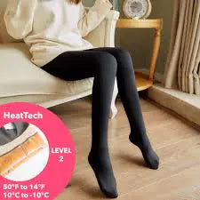 Chic look featuring Luxurious Women's Fleece Lined Tights in classic black, ideal for winter outings while ensuring warmth and durability.