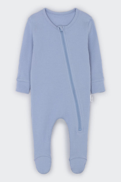 Luxurious powder blue zip sleepsuit for babies by DreamBuy, crafted from soft ribbed cotton for ultimate comfort and style.