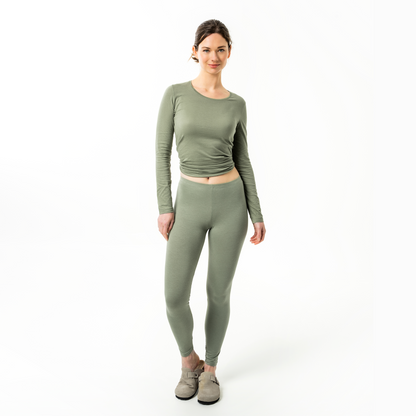 Luxurious high-rise organic cotton stretch leggings for women, showcasing a slim-fit silhouette and double seam hems for enhanced durability, epitomising comfort and style.