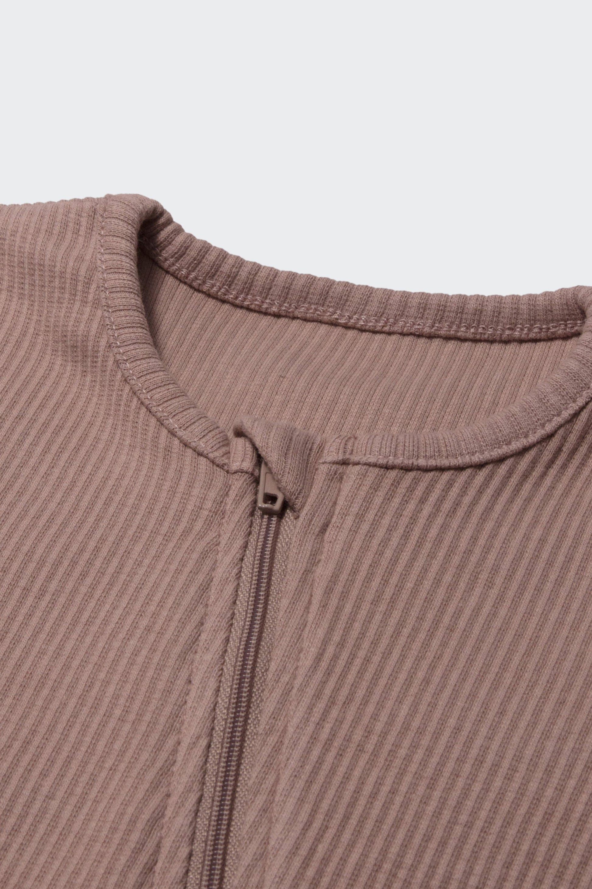 Luxurious Claret Red Zipper Sleepsuit for Babies by DreamBuy, designed for ages 0-36 months, featuring soft and comfortable fabric that ensures a snug fit for ultimate comfort during sleep or play.