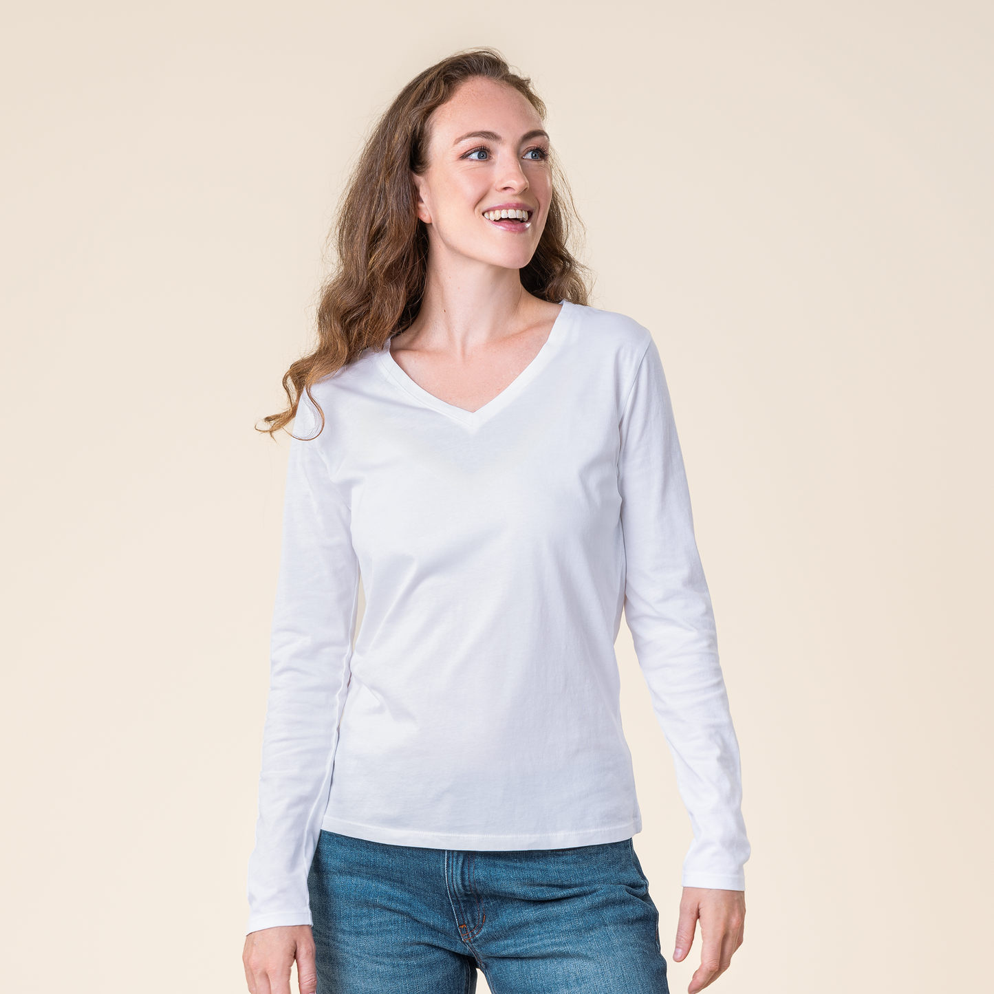 Detail view of the ribbed cuffs on the luxurious organic cotton long sleeve V-neck top for women, ideal for a vegan lifestyle.