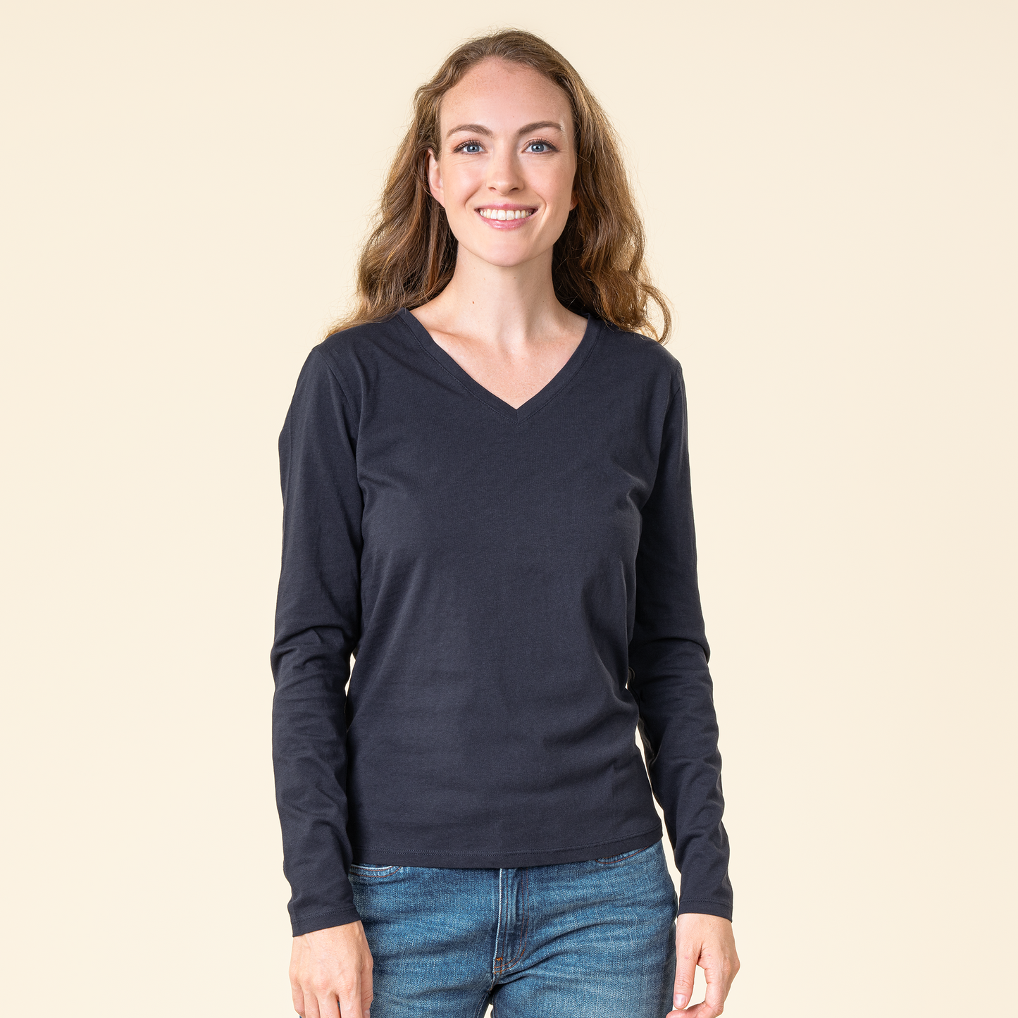 Luxury Organic Cotton Long Sleeve V-Neck Top for Women, showcasing a modern and comfortable vegan-friendly design, crafted from 100% organic cotton.