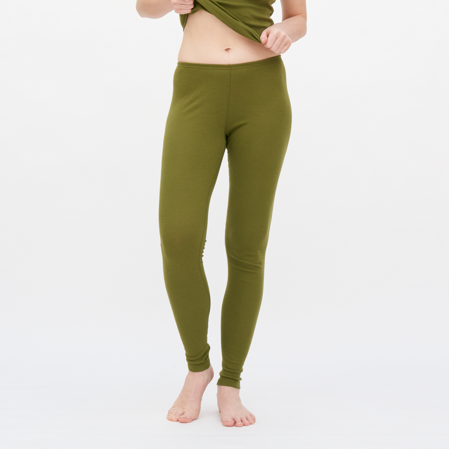 Luxurious women's wool and organic cotton leggings in elegant close fit, designed for layering in cooler weather.