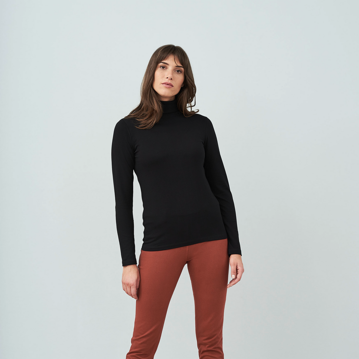 Close-up image of soft cotton jersey fabric showcasing luxurious texture of the long sleeve turtleneck t-shirt for women.