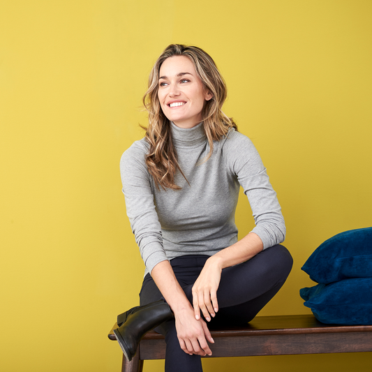 Luxury organic long sleeve stretch turtleneck t-shirt for women in slim fit, showcasing a chic folding neckline, crafted from soft, stretchy cotton jersey for ultimate comfort and elegance.