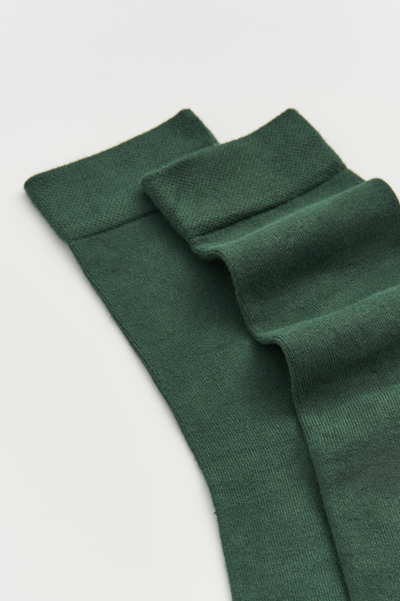 Close-up view of super soft bamboo calf-length socks with moisture-wicking properties, designed for comfort and style.
