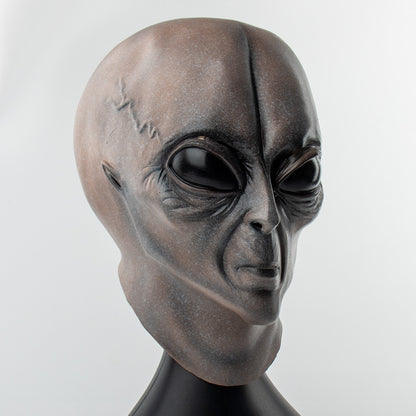 Elegant Realistic Grey Alien Mask latex headgear, presented from a frontal view, perfect for Halloween festivities and costume parties, all sizes available.
