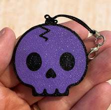 Skull Design Soda Can Tab Opener With Keychain Strap - an elegant purple skull keychain, adding a unique flair to your drink experience.