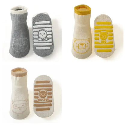 Elegant Women's Girls Non-Slip Safety Winter Warmer Grippy Socks displaying cute animal graphics, ensuring warmth and preventing slips during winter lounging.