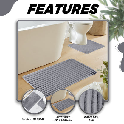 Stylish arrangement of the 2 Piece Ribbed Bath Mat Set, demonstrating its quick-dry features and superior absorbency in a contemporary bathroom setting.