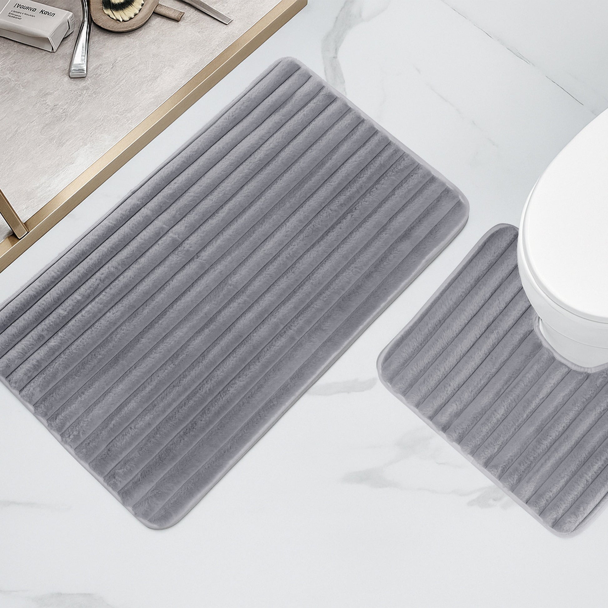 Close-up view of the plush ribbed texture of Olivia Rocco's Charcoal Bath Mats, emphasizing comfort and durability for bathroom elegance