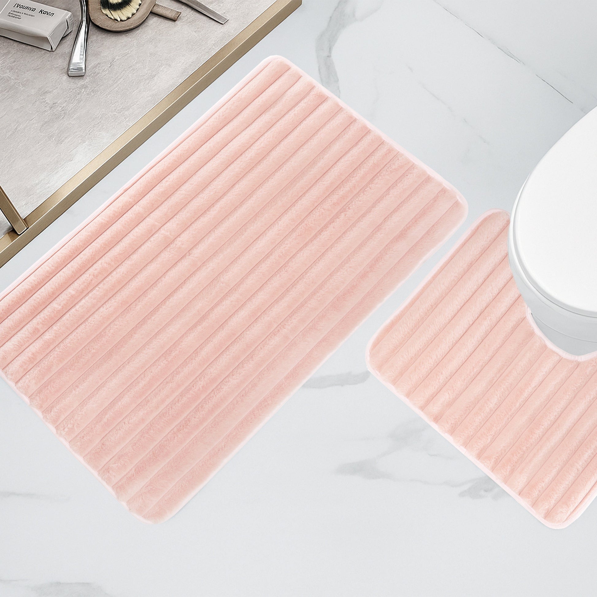High-grade polyester TPR anti-slip backing of the Luxurious 2 Piece Ribbed Bath Mat Set in chic pink, providing superior safety and durability for modern bathrooms.