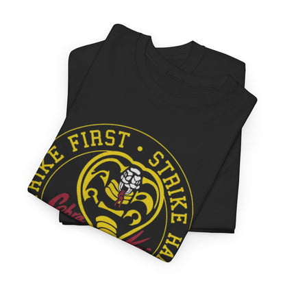 Luxurious Cobra Kai Unisex T Shirt showcasing two folded graphic tees with the famous Cobra emblem and motto 'Strike First, Strike Hard, No Mercy', ideal for fans of martial arts fashion.
