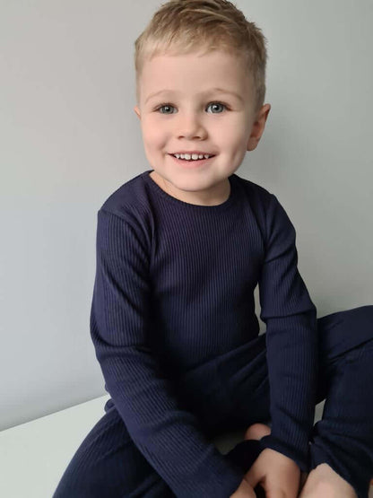 Luxurious Oxford Blue Family Matching Pajamas by DreamBuy, crafted from breathable cotton for ultimate comfort and style, suitable for all ages from newborn to adult XXL.