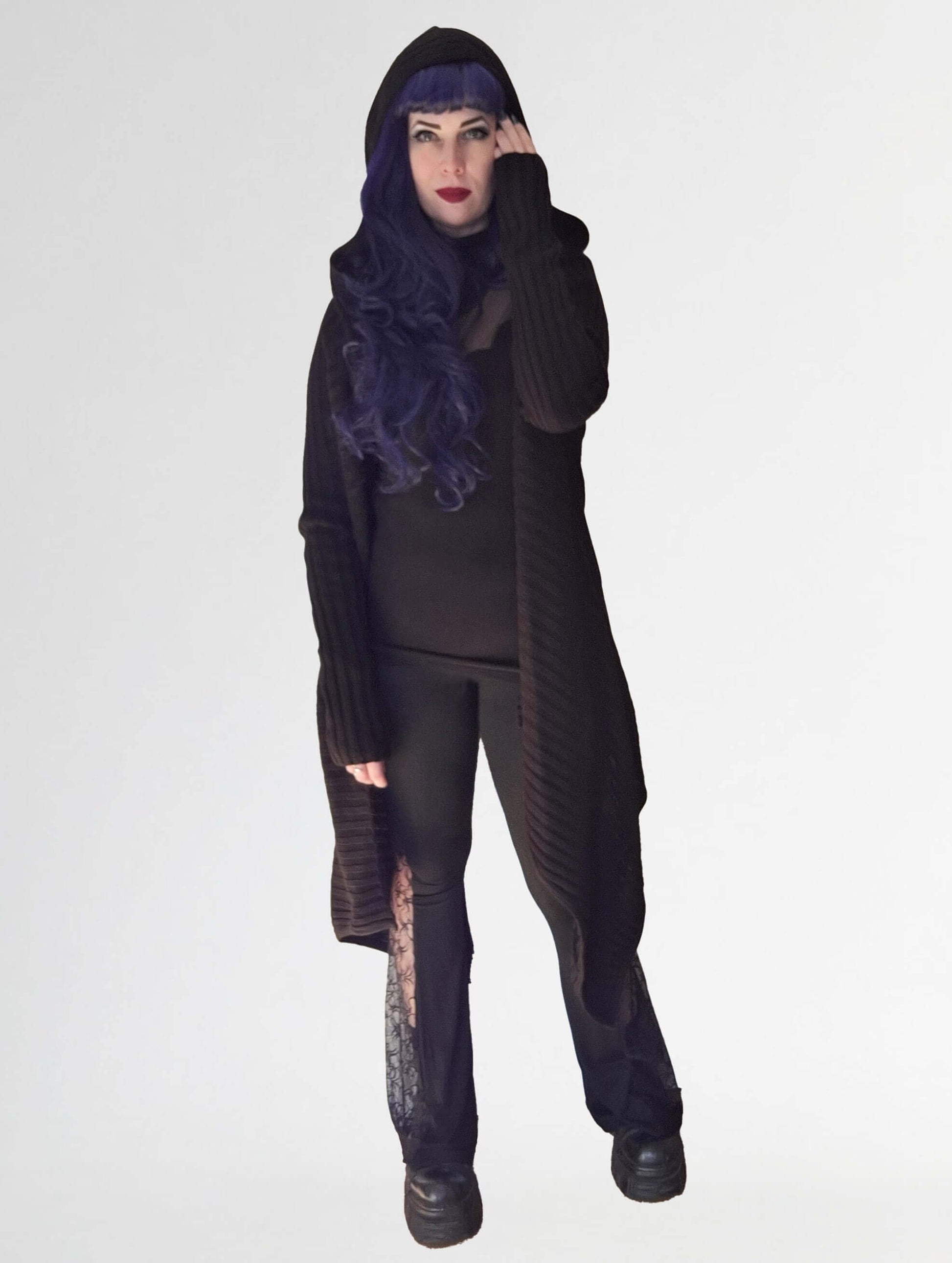 Necessary Evil Sabrina Cardigan worn with leggings and boots, illustrating its versatility for casual daywear while maintaining a chic gothic aesthetic.
